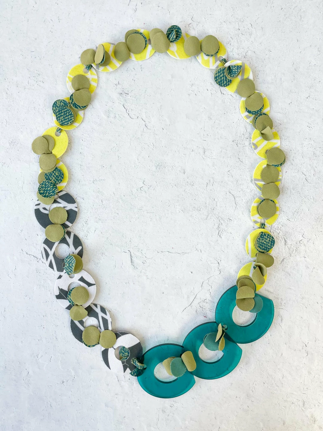 Pattern Gems Rhythm Necklace, Clear Teal/Yellow